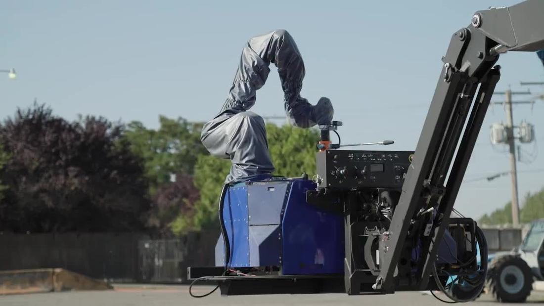 Raise Robotics arm on a boom-lift chassis.