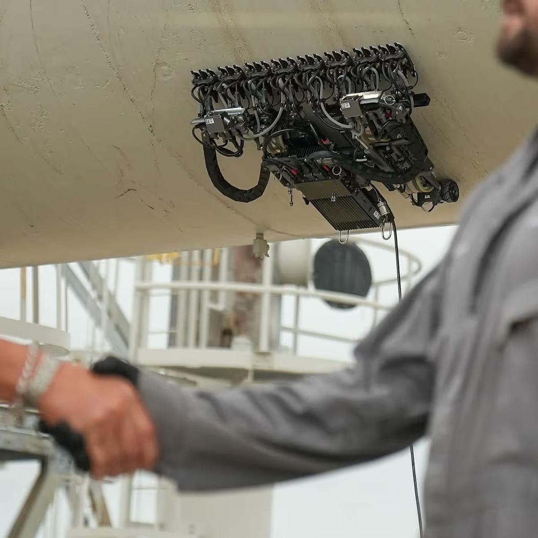 Gecko crawler on the surface of a steel vessel. Where: Industrial plant (not stated)