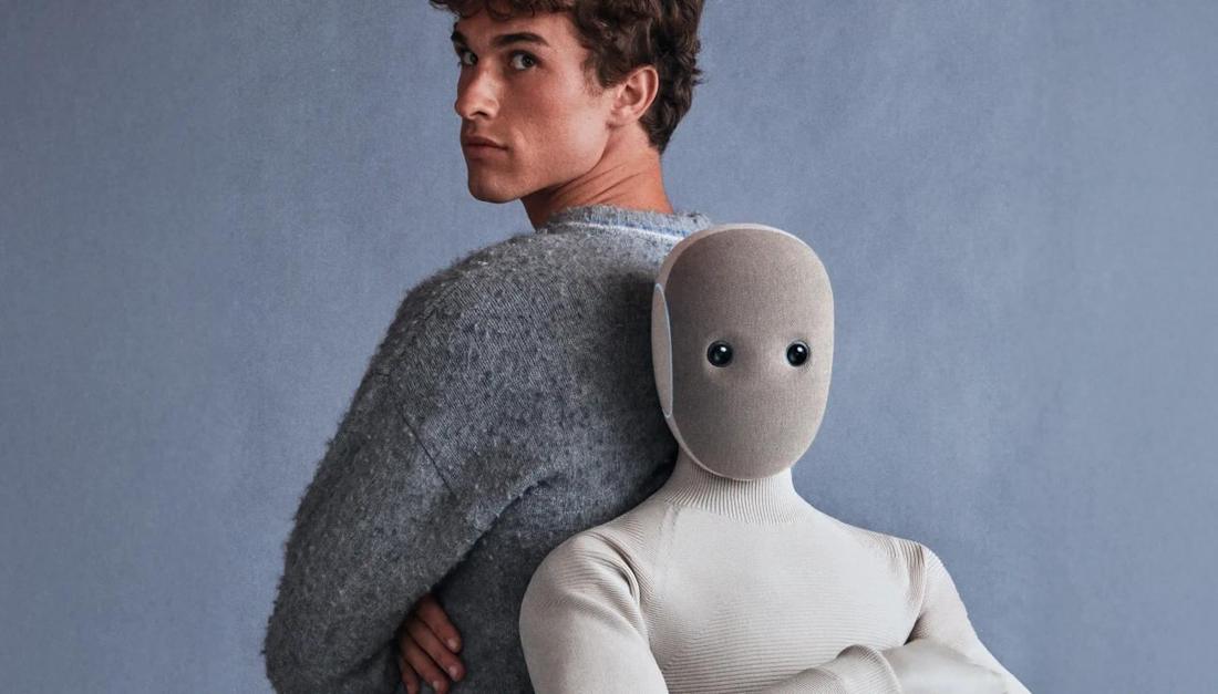 The 1X NEO home humanoid in a studio portrait. Where: Studio (not a real home).
