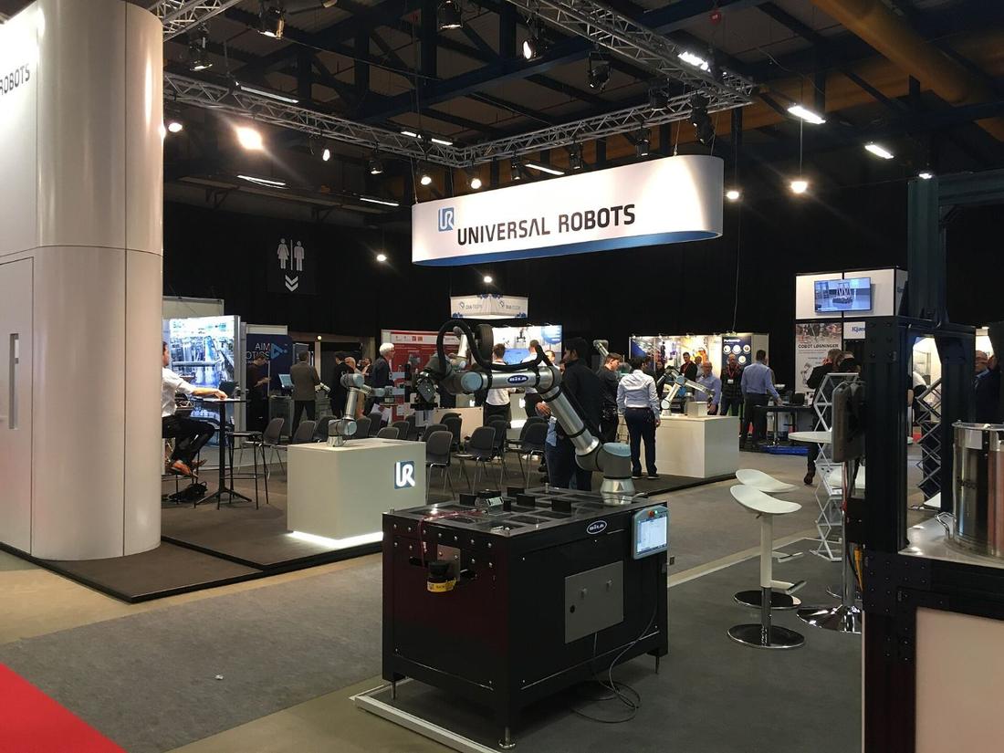 Universal Robots stand at a trade fair.