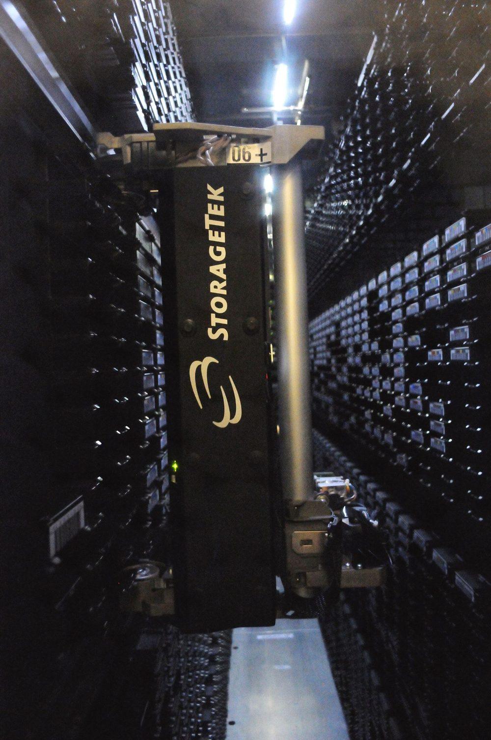 Tape library accessor in a data-center hall. Where: NERSC (per Commons file title)