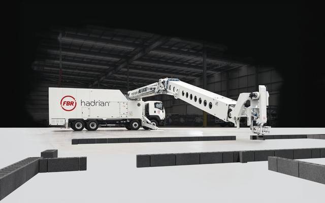 Hadrian brick-laying truck in a large hall