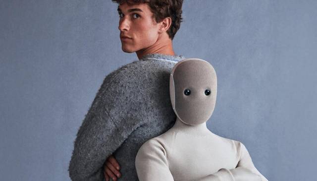 The 1X NEO home humanoid in a studio portrait.